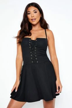 Solado Asymmetrical Neck Lace Up Front Mini Dress